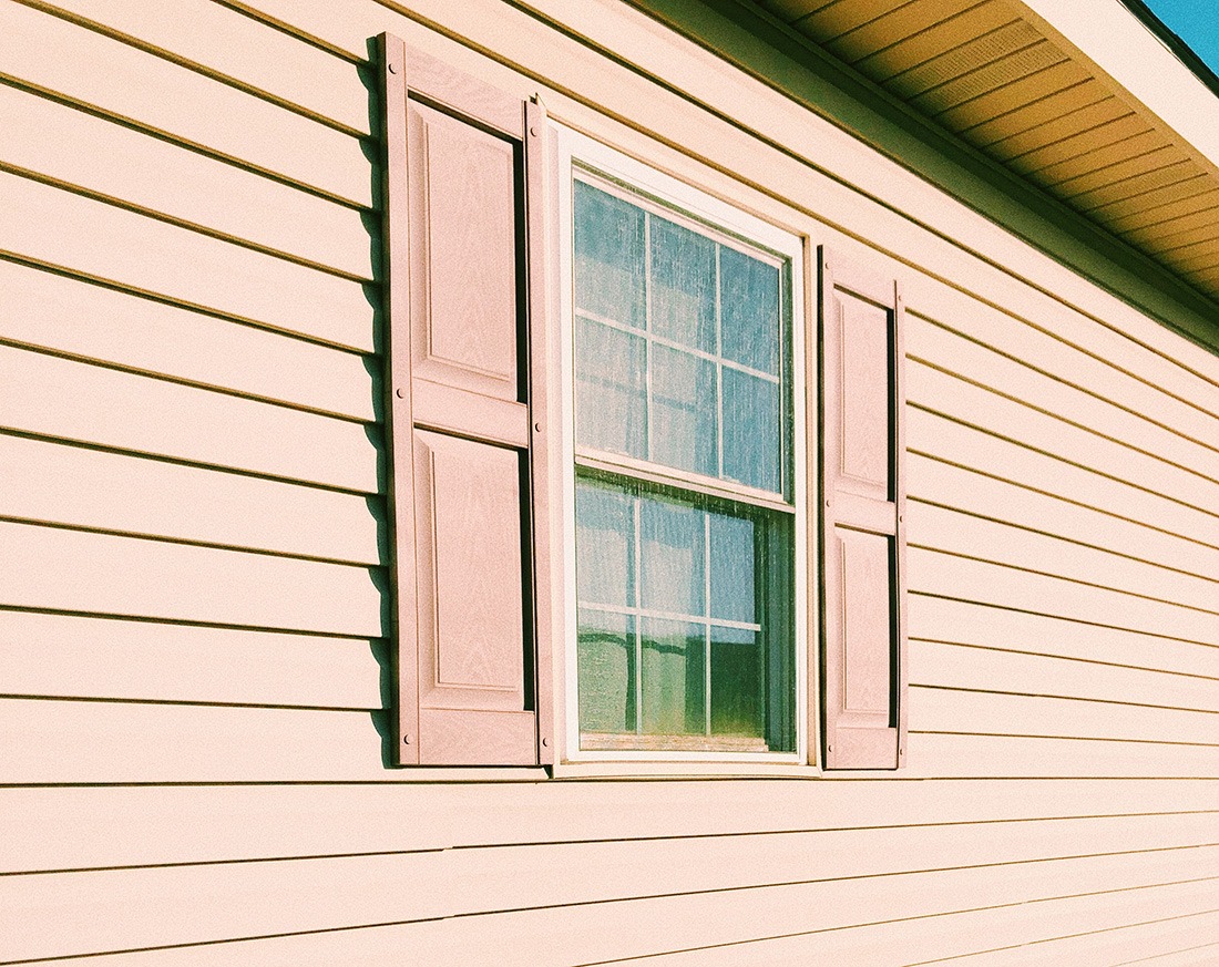siding, window, and shutters on a house