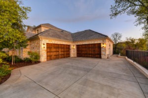 stained dual wooden garage doors