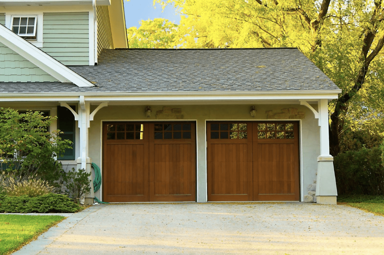 wood garage doors on a home with a two car garage