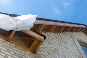 Preparation for installation soffit board in the roof when making soffit repairs
