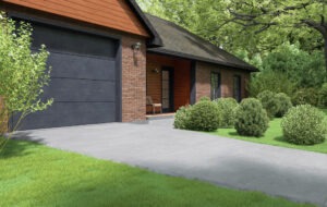Close-up of a dark garage door in a brick house